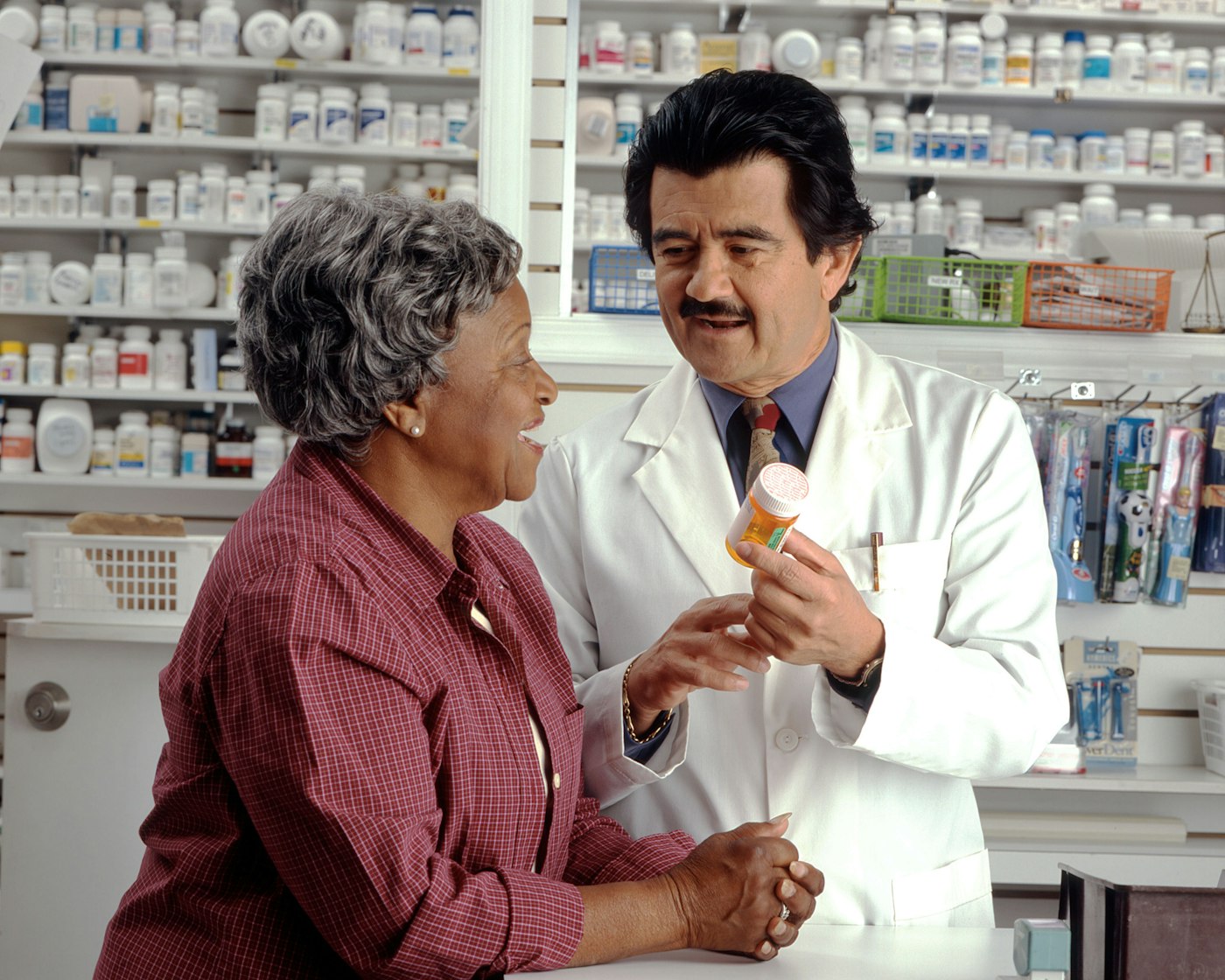 Our pharmacist helping a customer in the pharmacy