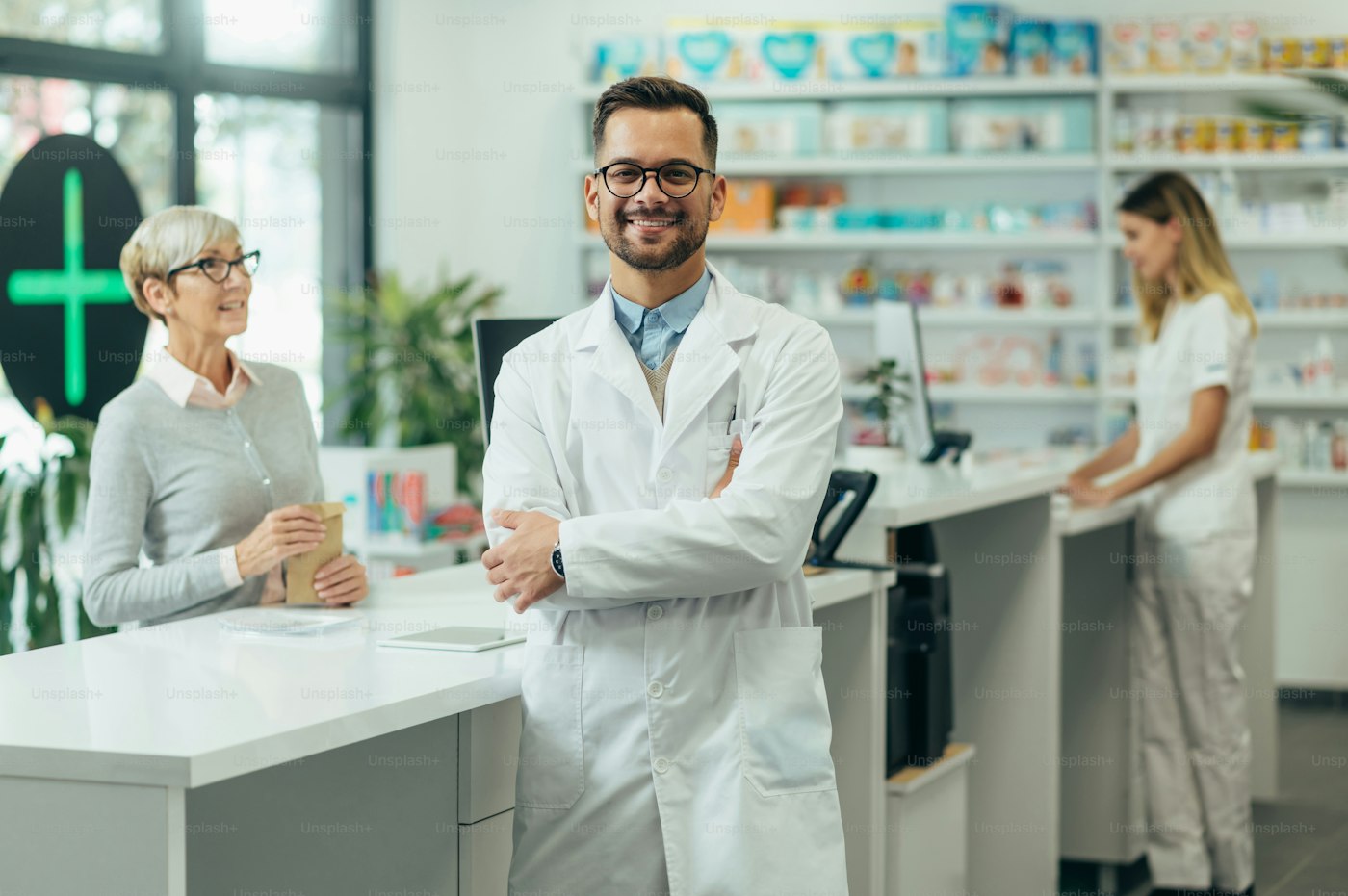 A friendly pharmacist inside Outapi Pharmacy